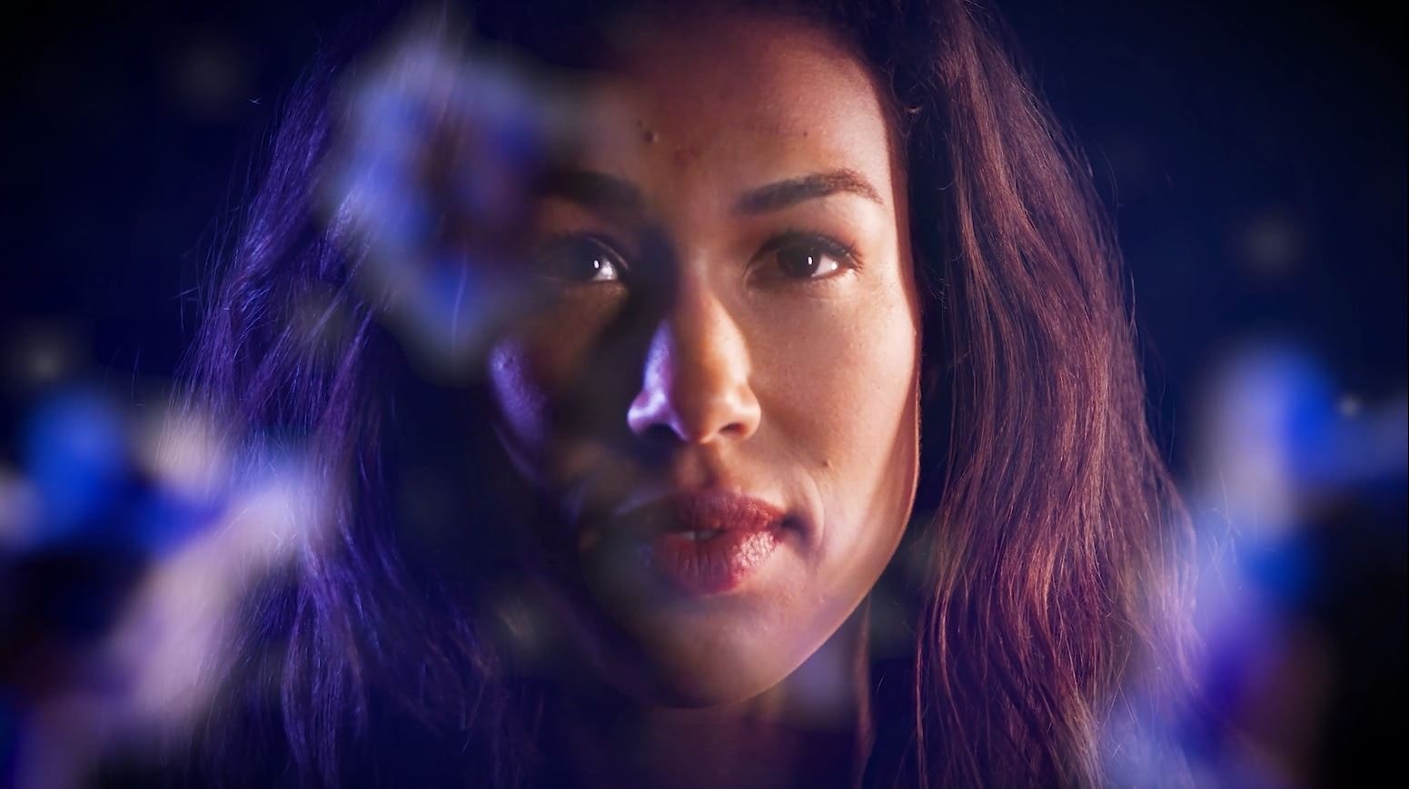 Woman looking up surrounded by transparent antibodies.jpg